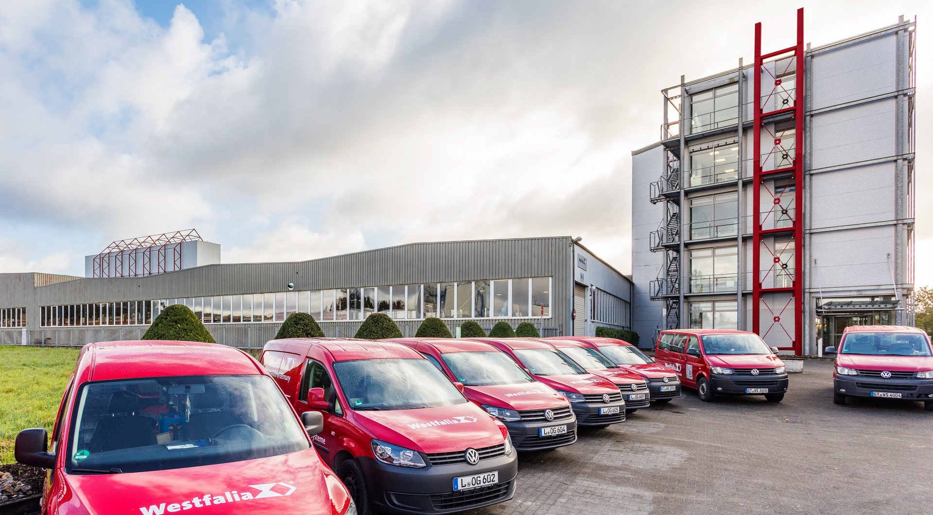 Service fleet in front of the former headquarters of Westfalia Technologies Gmbh & Co. KG